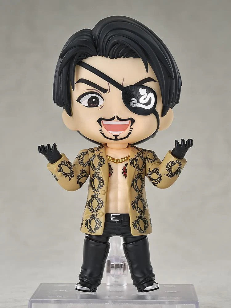 The Majima Nendoroid figure with the cheerful smiling face plate, posed with hands up, welcoming a challenge.
