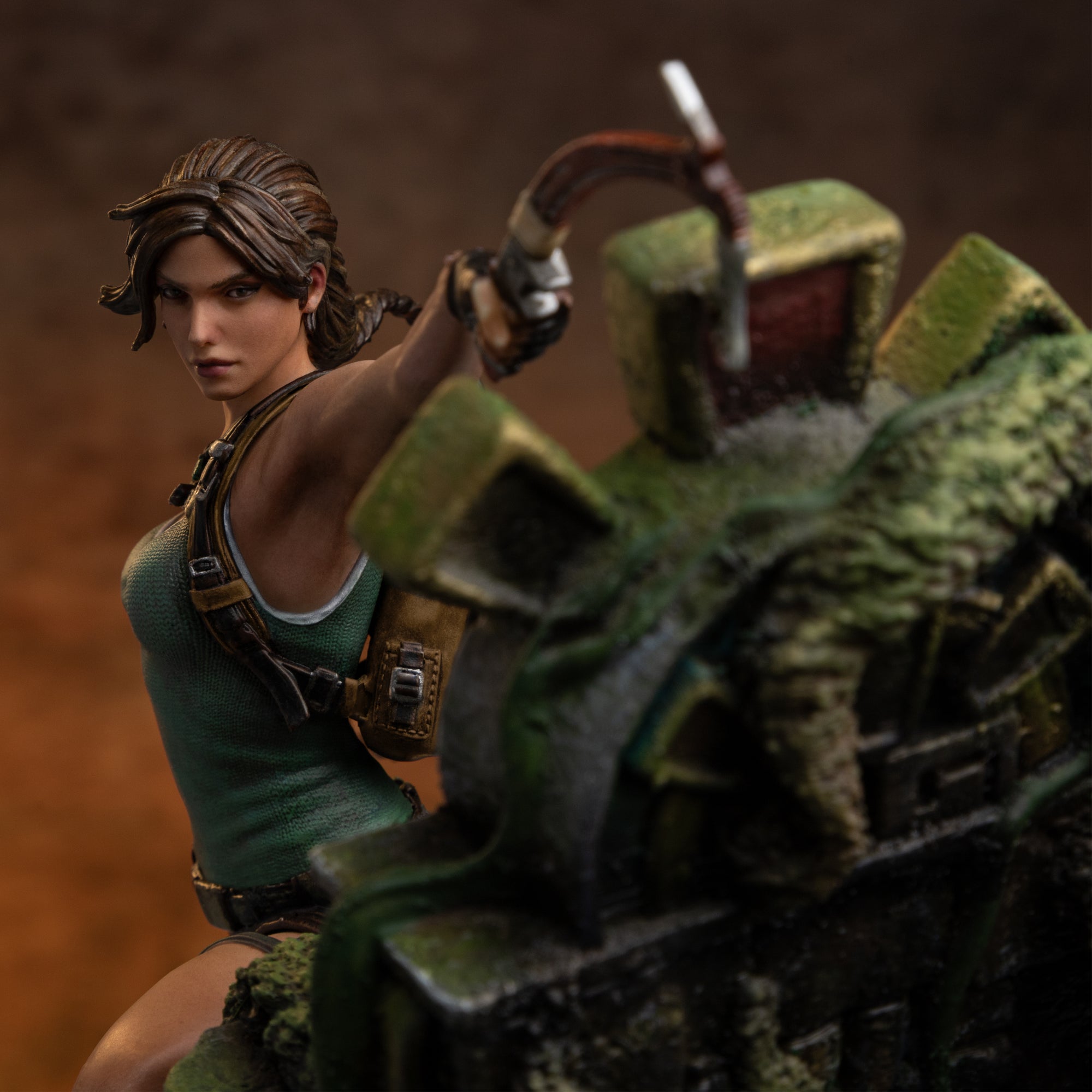 A close-up of Lara Croft's determined face, looking over her shoulder while holding a climbing axe.