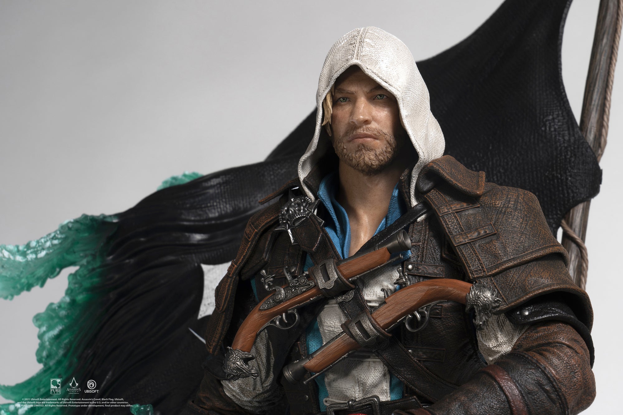 A close-up shot of Edward Kenway's face and upper body on the Animus statue, showcasing the realistic detail of his beard, hair, and clothing.