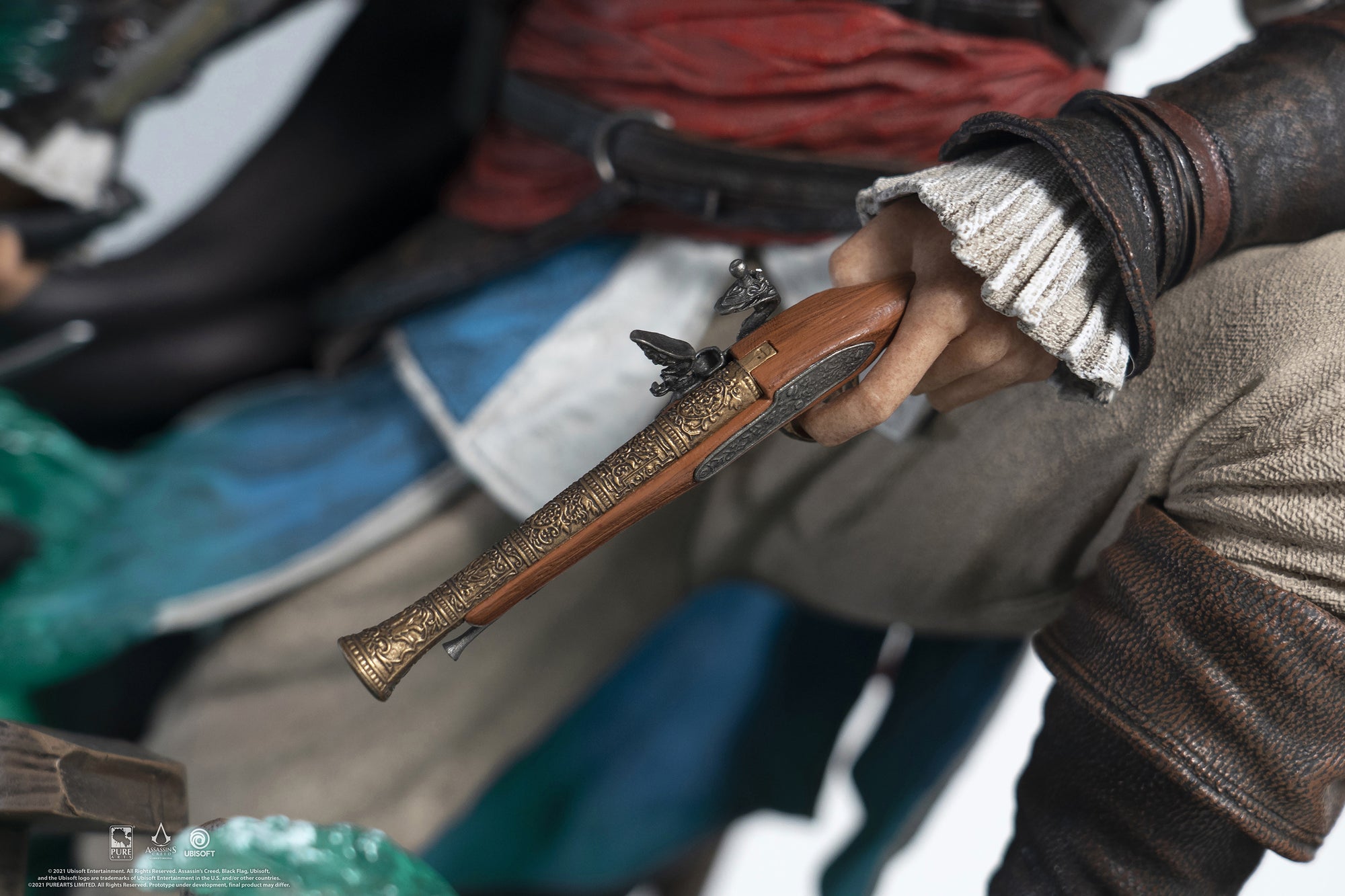 An extreme close-up of Edward Kenway’s hand on the statue, showing the intricate detail of his flintlock pistol and his ruffled shirt sleeve.