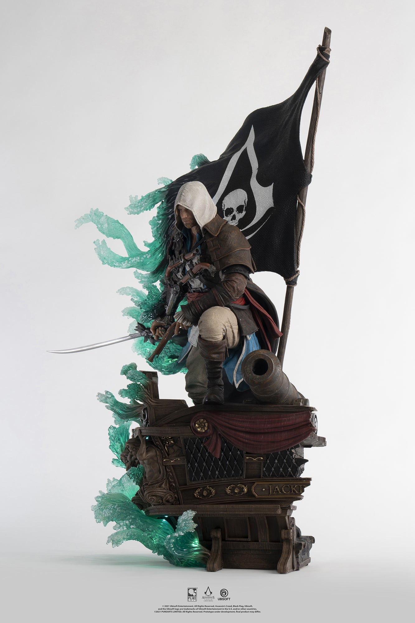A three-quarter view of the Animus Edward Kenway statue, showing the full pose with his saber drawn and the intricate base.