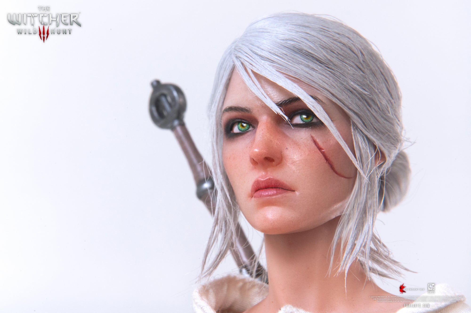 Close-up portrait of the Ciri articulated figure, capturing a serious and determined expression.
