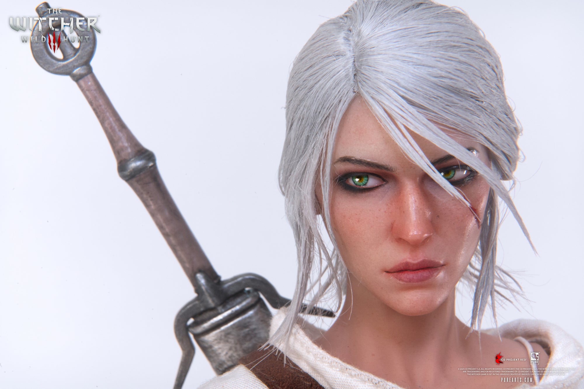 Close-up of Ciri's face, focusing on her lifelike expression and the hilt of the metal Zireael sword.
