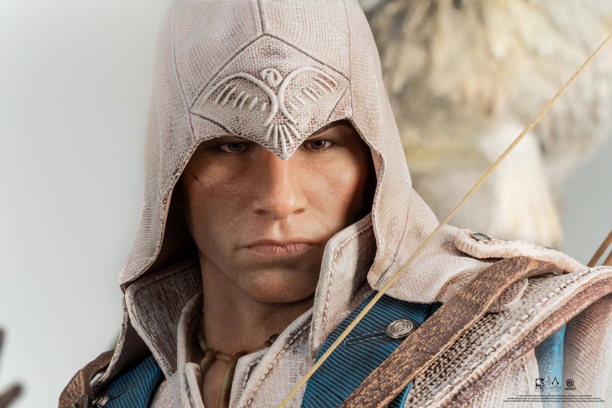 A very close-up shot of the face of the Animus Connor statue, highlighting the realistic skin texture, facial expression, and his trademark scar.