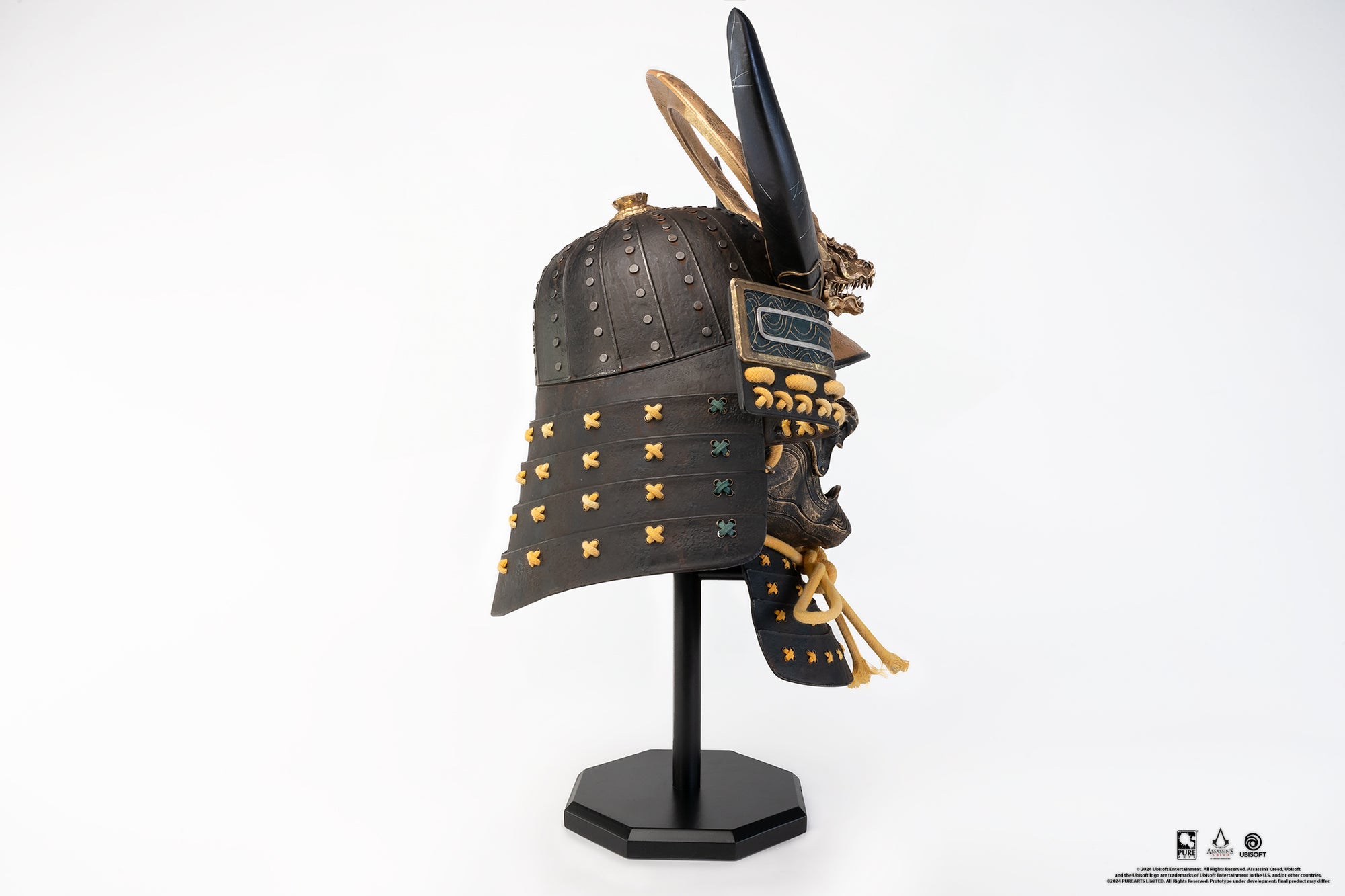 Left side view of the full PureArts Yasuke helmet replica displayed on its stand, showing the detailed side profile and the impressive scale.