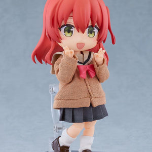 Cheerful Ikuyo Kita Nendoroid Doll figure smiling and flashing double peace signs in her fabric high school uniform outfit.