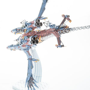 Model kit of the AAA Wunder showing the articulation and ability to pose in a deep roll maneuver.