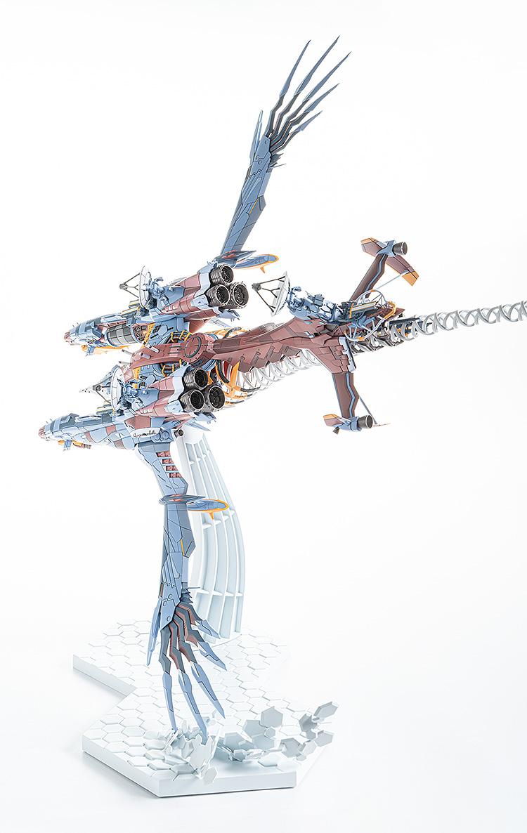 Model kit of the AAA Wunder showing the articulation and ability to pose in a deep roll maneuver.