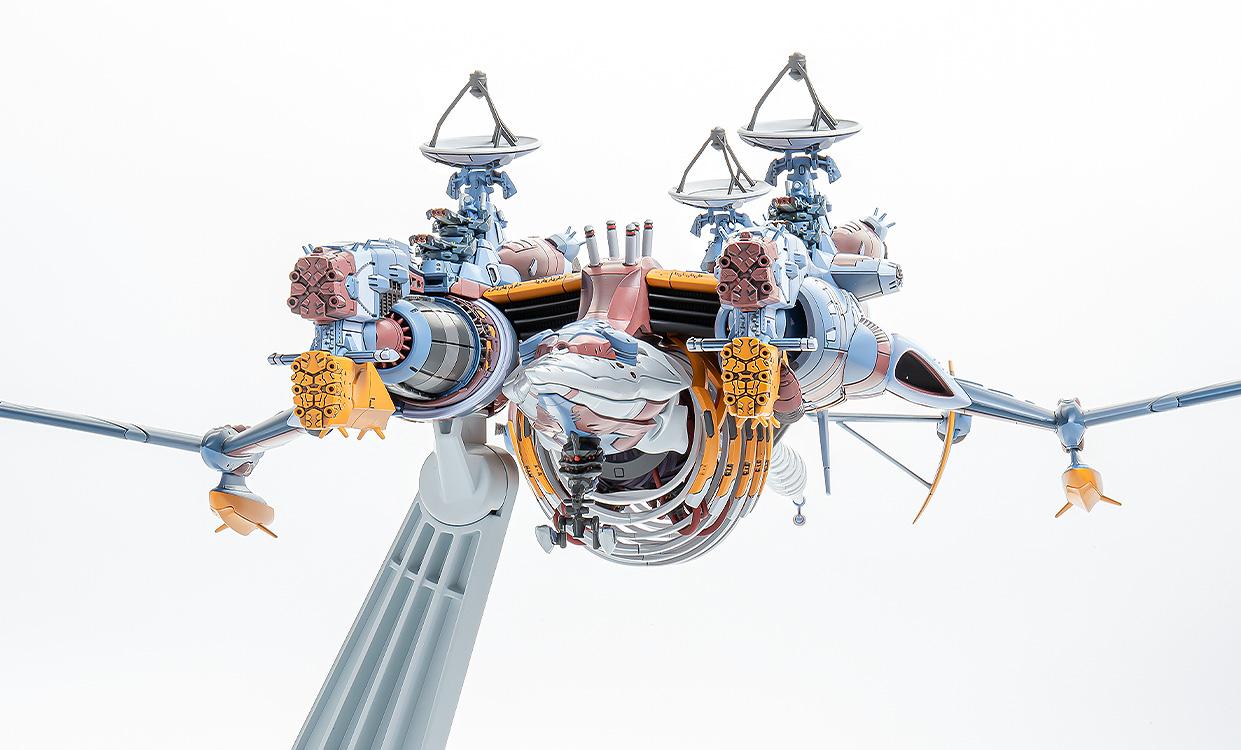 Close-up front-facing view of the AAA Wunder's main armament and articulated antenna arrays.