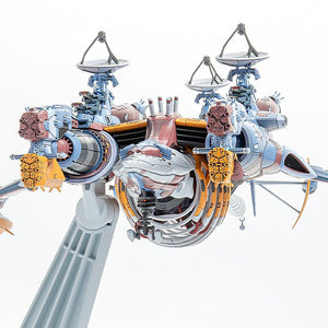 Close-up front-facing view of the AAA Wunder's main armament and articulated antenna arrays.