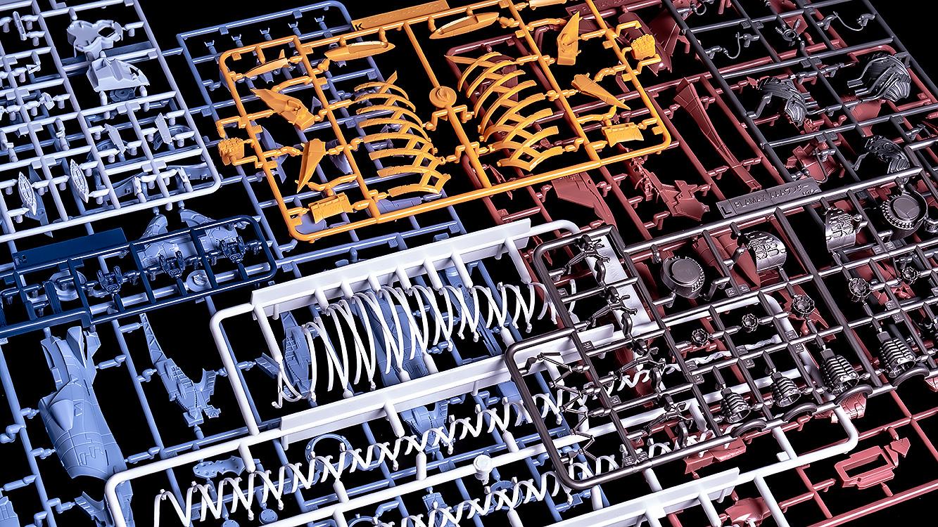 Nine different colored plastic runners and parts included in the PLAMAX AAA Wunder model kit box.
