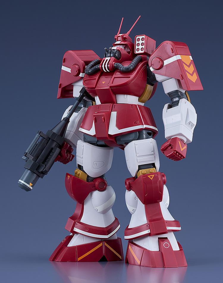 Front standing view of the assembled 1/72 scale Blockhead Combat Armor GT version plastic model kit showcase on a solid blue-grey studio background.