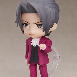 Ace Attorney Miles Edgeworth Nendoroid figure holding a white court document paper on clear stand.