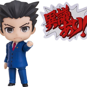 Phoenix Wright Nendoroid figure pointing forward with confident expression on white background.