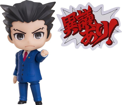 Phoenix Wright Nendoroid figure pointing forward with confident expression on white background.