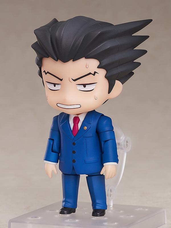 Phoenix Wright Nendoroid figure posed with translucent red Psyche-Lock effect sheet.