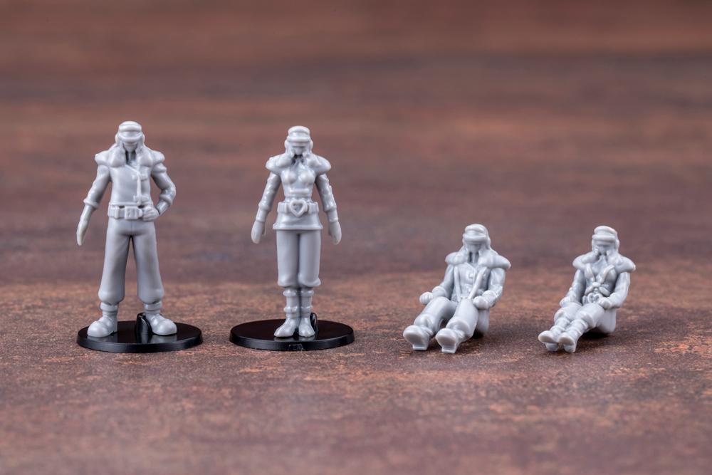Group shot of the four newly sculpted Ala Barone Red and Purple Mask pilot figures, standing and seated.