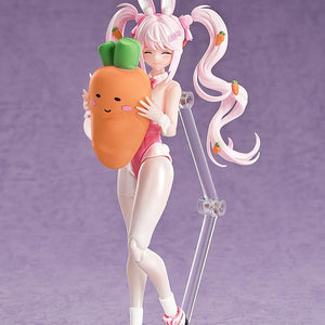 Alice bunny action figure featuring the closed-eyes face plate while hugging her carrot pillow.