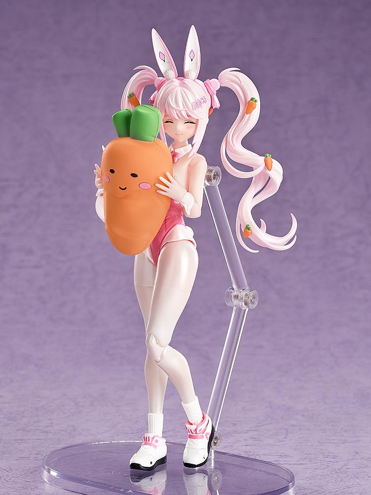Alice bunny action figure featuring the closed-eyes face plate while hugging her carrot pillow.