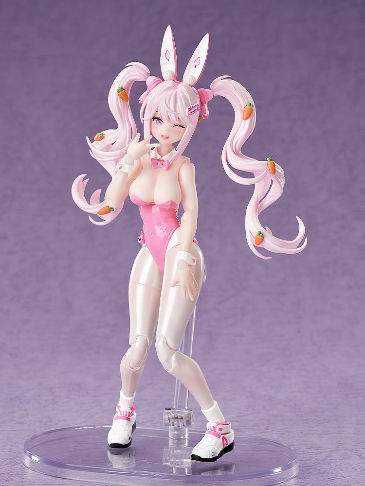 Playful pose of the Alice bunny figure with a winking face plate and hand near her mouth.
