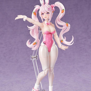 Alice bunny figure demonstrating arm articulation and a standard smiling face plate on a display stand.