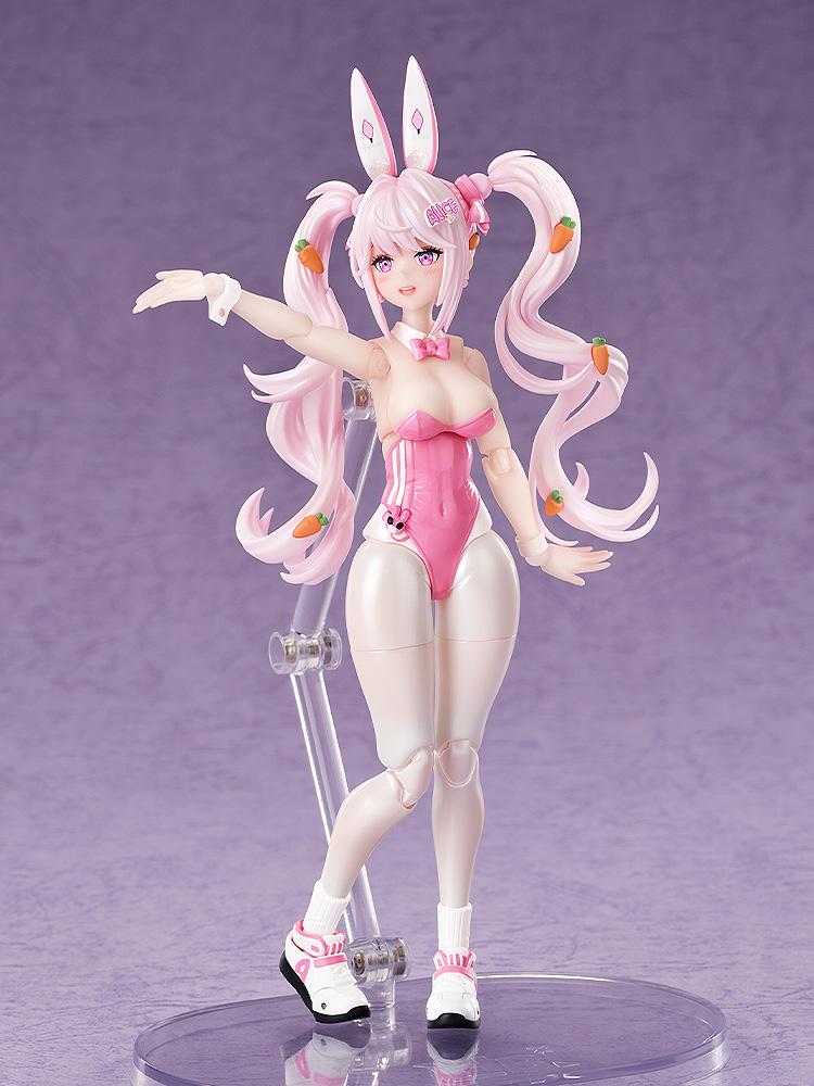 Alice bunny figure demonstrating arm articulation and a standard smiling face plate on a display stand.