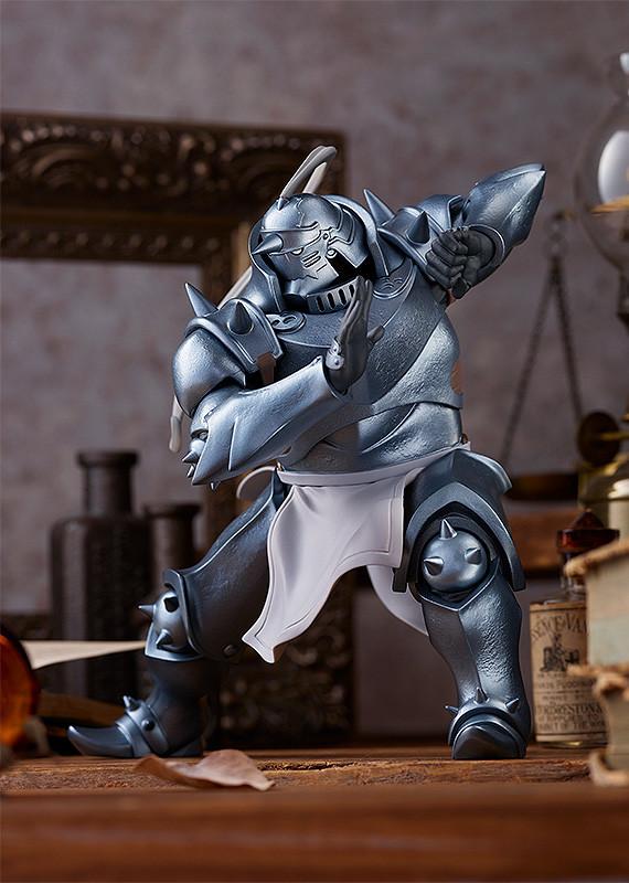 A heroic low-angle view of the Alphonse Elric POP UP PARADE reissue, emphasizing the heavy and grounded presence of the armor.