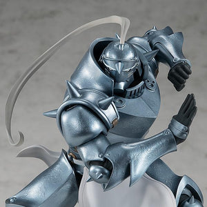 Front-facing close-up of the Alphonse Elric figure's upper body, showing the visor and chest plate details in high definition.