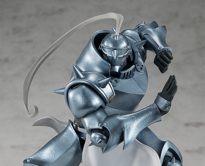 Front-facing close-up of the Alphonse Elric figure's upper body, showing the visor and chest plate details in high definition.