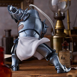 Rear view of the Alphonse Elric armor figure showing the intricate plating, leather straps, and white cloth detail.