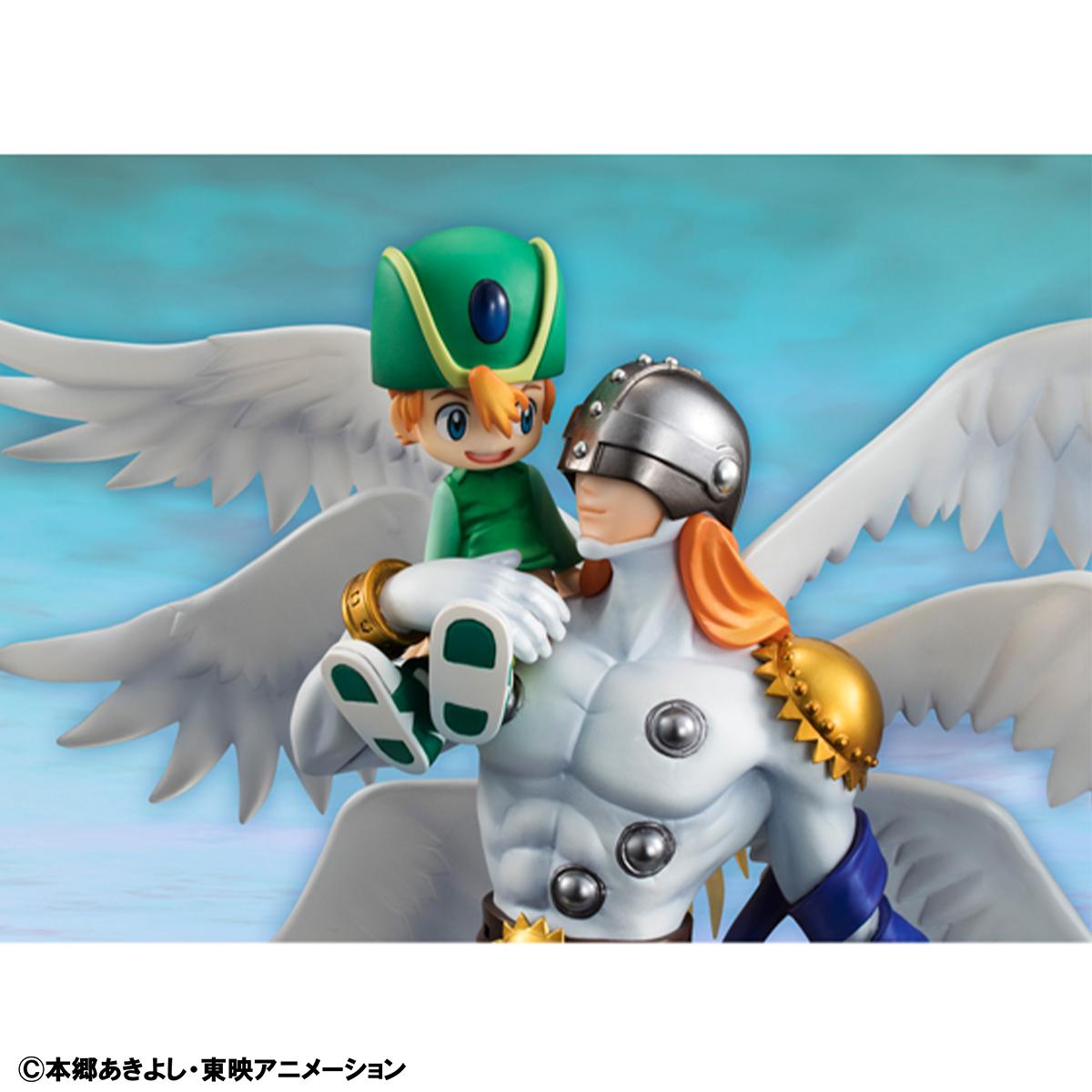 Detailed close-up of Angemon holding a smiling T.K. Takaishi, featuring the Holy Ring and silver helmet.