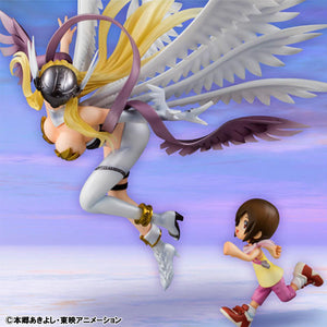 The Angewomon and Hikari Yagami figure set displayed against a purple and blue sky-themed digital background.