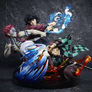 Aniplex Demon Slayer vignette figure featuring Tanjiro Kamado, Giyu Tomioka, and Akaza in a battle scene with fire and water effect parts on a dark background