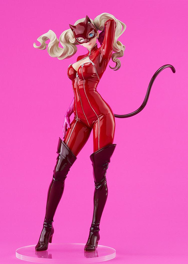Studio shot of the Panther collectible figure on a vibrant pink background, showcasing her iconic whip tail and cat-themed mask.