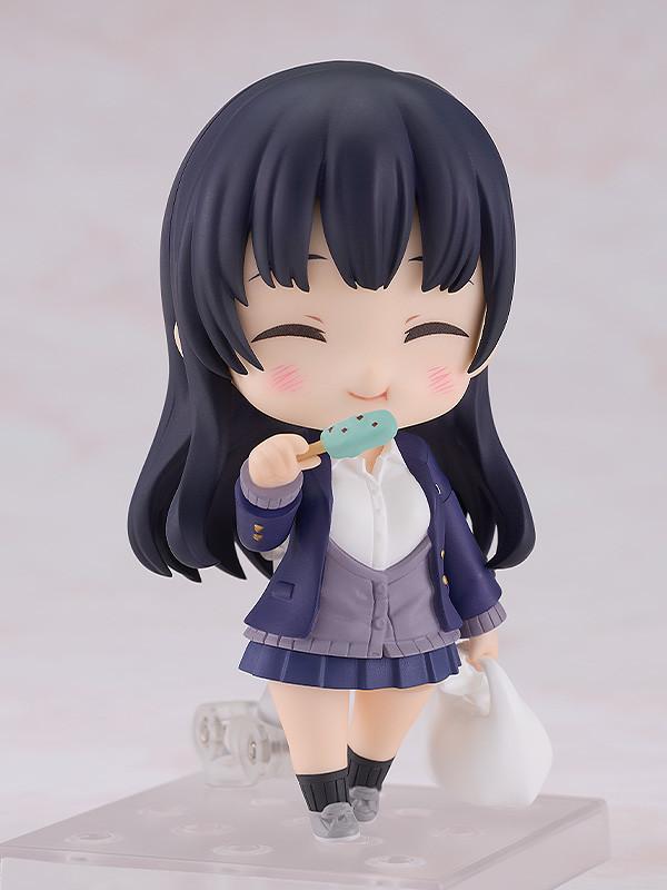 Anna Yamada Nendoroid figure enjoying chocolate mint ice cream while holding a shopping bag, featuring her blushing eating expression.