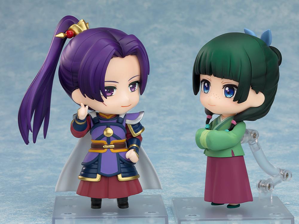 Side-by-side display of the Jinshi Armor Version Nendoroid figure posing next to the Maomao Nendoroid figure against a light blue backdrop.