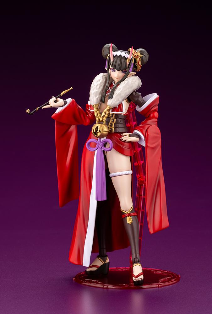 Front view of Arcanadea Ornela plastic model kit in Normal Mode standing on a clear red display base