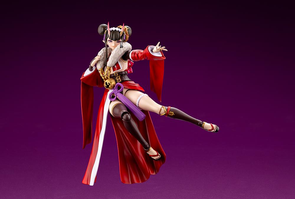 Dynamic flying kick pose of Ornela model kit showcasing leg articulation and flowing robes