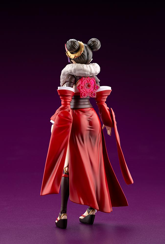 Rear view of Ornela in Normal Mode displaying her red robe drape and back emblem detail