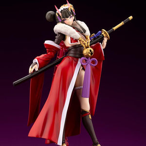 Ornela model kit in Normal Mode holding a long sheathed katana horizontally across her waist