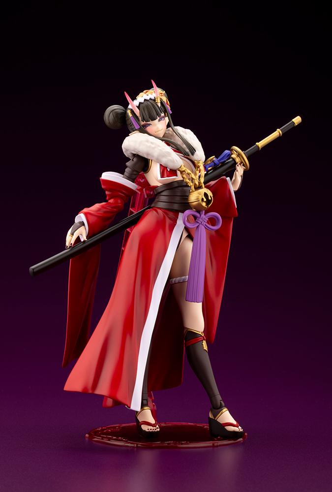 Ornela model kit in Normal Mode holding a long sheathed katana horizontally across her waist