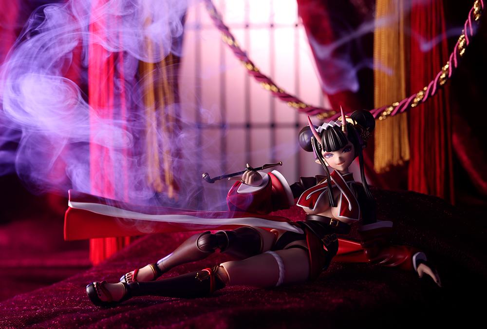 Dramatic studio shot of Ornela lounging with purple smoke rising from her smoking pipe