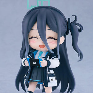 Side angle of the Aris Tendou Nendoroid figure with a happy blushing face, holding a blue and black gaming console accessory.