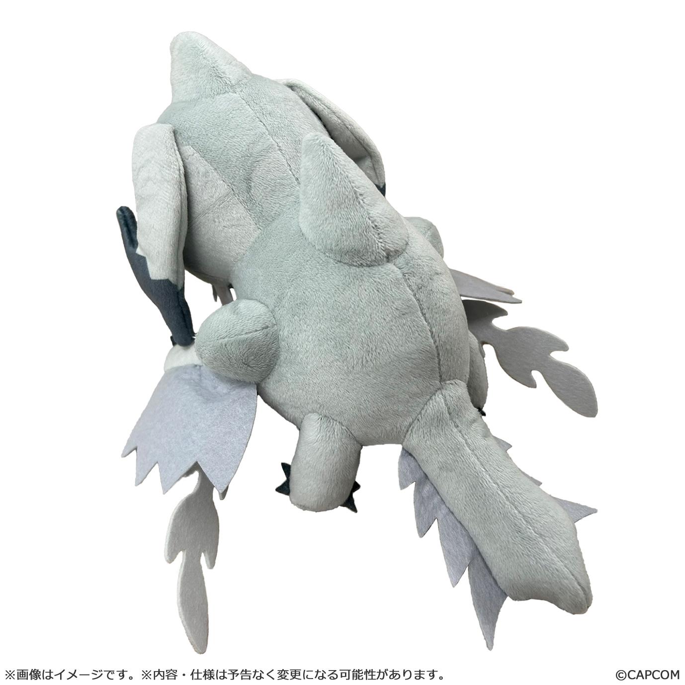 Rear view of the Arkveld chibi plush showcasing the armored tail and wing-arm tendrils based on the flagship monster.