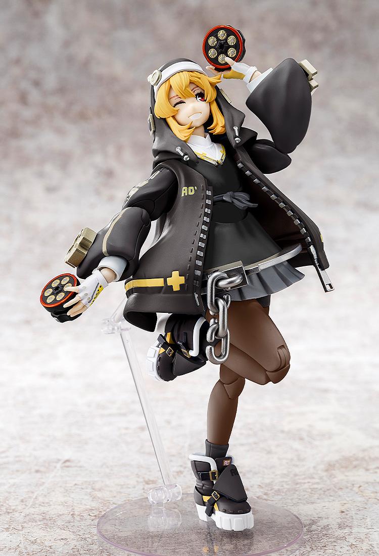 Side view of the Bridget articulated plastic model kit showcasing the high level of detail in the black hoodie and yellow accents.