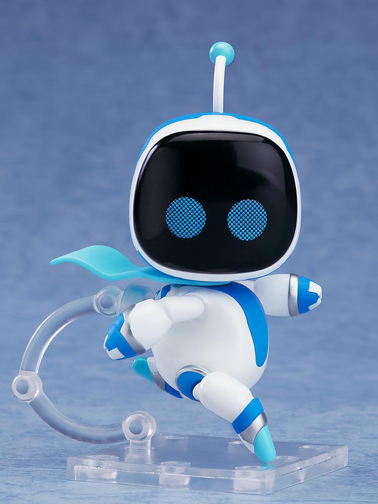 Astro Bot Nendoroid Surprise Running version figure with a blue cape, dynamically posed mid-run on an articulated clear display stand.