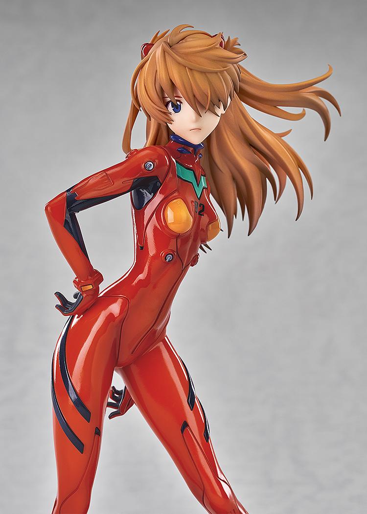 Mid-shot close-up of the Asuka Shikinami Langley figure highlighting the glossy finish of the red plugsuit and torso details.