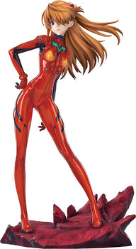 Full-length front view of the Asuka Shikinami Langley 1/7 scale figure in her red plugsuit, standing on a rocky base.