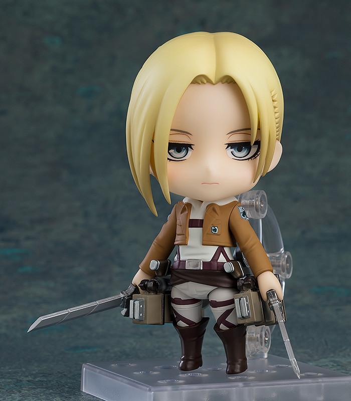 Attack on Titan Annie Leonhart Nendoroid figure standing with dual blades in Military Police uniform.