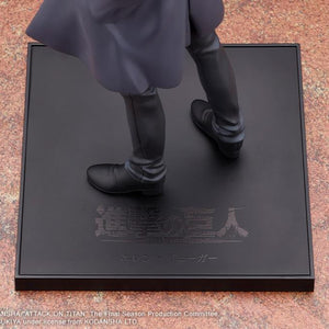 Detailed shot of the black magnetic display base engraved with Japanese Attack on Titan and Eren Yeager title logos